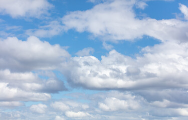 White clouds against a blue sky