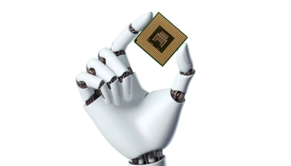 Robotic arm or robot hand holding an AI chip artificial intelligence on transparent background