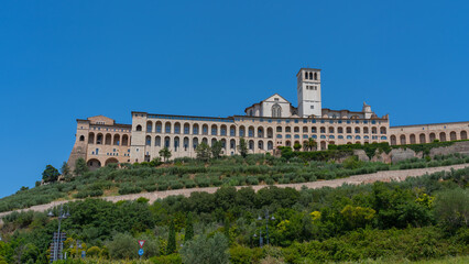 Basilica of Saint Francis of Assisi in Assisi, Umbria, Italy. The Basilica of Saint Francis of Assisi is the mother church of the Roman Catholic Order of Friars Minor Conventual. 