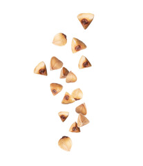 Buckwheat groats in the air close up on a transparent background