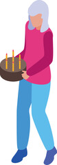 Senior woman is walking while carefully holding a birthday cake with lit candles