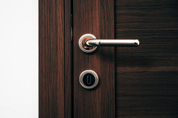 Interior door metallic handle with keyhole