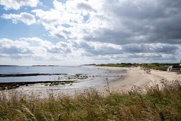 Beach with rocks at one end in Northumbria
