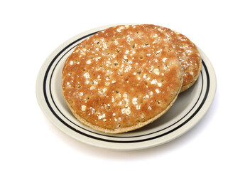 Stack buns with sesame seeds on a white background