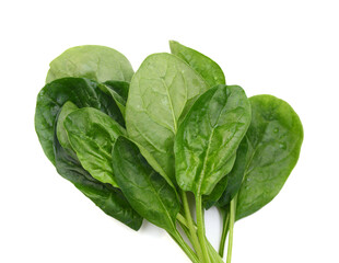 Green spinach leaves on white background