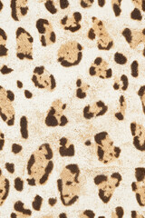 Leopard print pattern with realistic brown and black spots on a light background. The design is classic, bold, and wild, suitable for fashion and design use.
