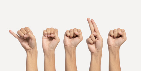 Deaf alphabet letter "Jesus" by hand. The letter "Jesus" in sign language, isolated on a white background. Hand movements. hearing disorders. language that uses the visual manual modality. © Luqman Aditiamala
