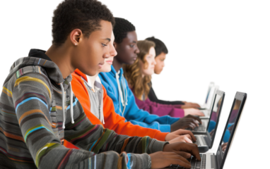 Students in Computer Lab with Laptops Isolated Isolated on Transparent Background PNG. Isolated on Transparent Background PNG.