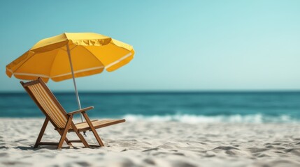 This image shows a bright yellow umbrella and a wooden beach chair on a calm, empty beach, with clear blue skies and ocean waves in the background.