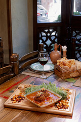 Large stuffed meatballs cooked in tomato sauce