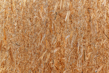 Fragment of a particleboard surface,  for use as an abstract background and textures.