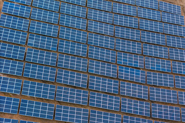 Top view of solar farm with hundreds panels on field, Energy transition with carbon neutral
