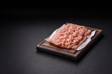 Fresh raw chicken mince with salt and spices