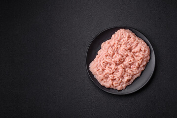 Fresh raw chicken mince with salt and spices
