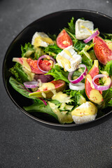 fig salad green lettuce, figs, soft cheese fresh meal food snack on the table copy space food background rustic top view keto or paleo diet vegetarian vegan food