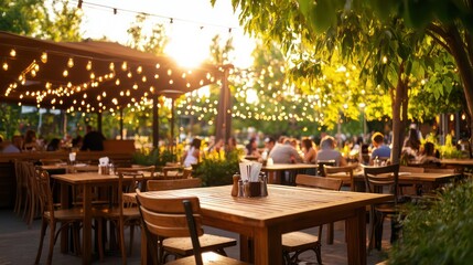Obraz premium A restaurant patio with tables and chairs, and people sitting at them. The atmosphere is lively and social