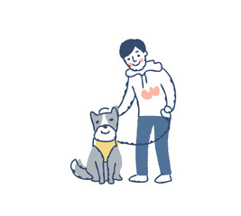 おすわりしている犬と飼い主の男性