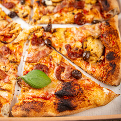 pizza chicken meat and olives, sausages, cheese, tomato sauce fresh meal food snack on the table copy space food background rustic top view