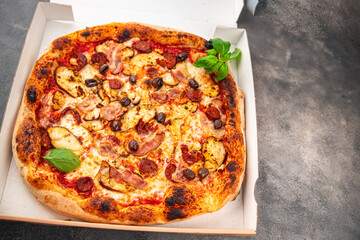 pizza chicken meat and olives, sausages, cheese, tomato sauce fresh meal food snack on the table copy space food background rustic top view
