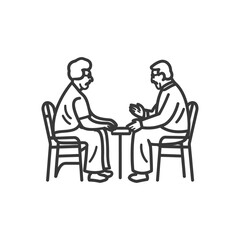 Elderly Couple Sitting at a Table Together