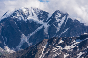 mountain landscape, view of Mount Donguzorun among clouds