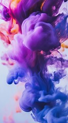 Fototapeta premium Colorful ink in water creating abstract patterns