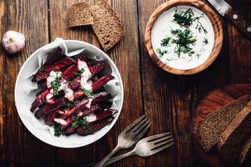 Oven baked beet fries with greek yogurt and dill