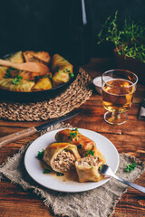 Two Cabbage Rolls Stuffed with Minced Meat and Rice on White Plate Served with Chopped Parsley