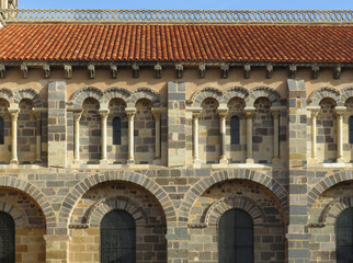 Obraz premium Romanesque Abbey of Saint-Austremoine. Issoire. 12 century. Auvergne. France. Detail of the lateral south facade. 