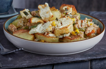 Minced chicken and vegetables potato bake with a Greek cheese topping.