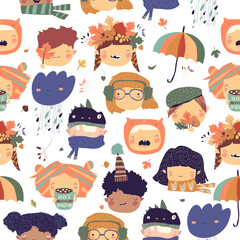 Seamless pattern with cute kids faces with autumn elements