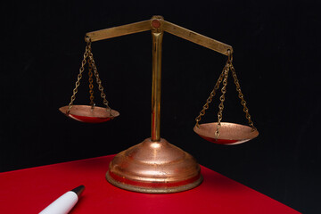 .scales of justice in an institutional environment with a book