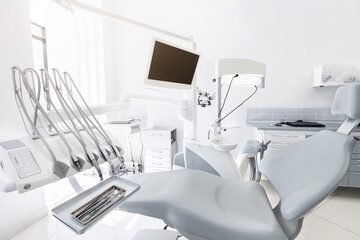 Dentist chair in newest dental clinic. VIP service in medical care, close up, copy space