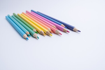 Colored pencils on colored background. Back to school concept. Draw