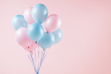 A cheerful arrangement of blue and pink balloons drifts gracefully against a soft pastel background, creating a joyful and festive atmosphere