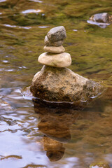 Stacked rocks in a river