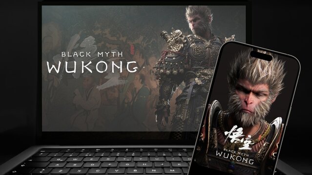 Black Myth Wukong game visual on a smartphone and laptop screen