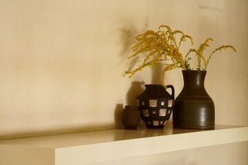 Yellow flowers in vase; tall goldenrod or giant goldenrod; Solidago Gigantea