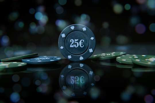 Poker chips on dark background, closeup