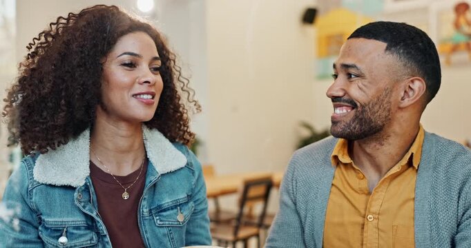 Coffee, conversation and people in cafe for first date bonding together with flirting connection. Happy, talking and young man and woman drink cappuccino at restaurant in morning for romantic meeting
