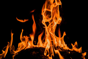 Fire flames on black background. Abstract blaze fire flame texture for banner background. Fire flames on black background. Fire flame texture.