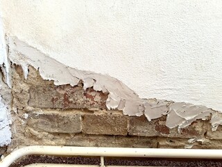 destruction of plaster on walls