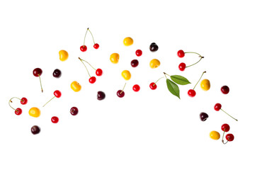 Flying different fresh cherries and leaves on white background