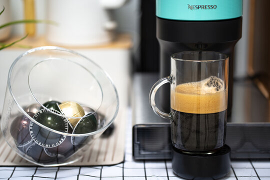 Pathum Thani, THAILAND August 21, 2024- Capsule coffee machine with espresso cup. Nespresso is worldwide leader company with coffe machines and capsules.	