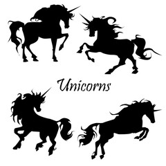 set of silhouettes of unicorns, horses. mythical animals