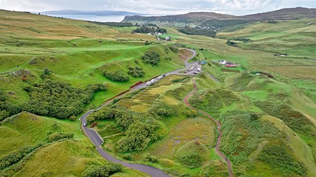 Aerial view of Scenic point The Fairy Glen in Isle of Skye, Scotland. Basalt hilltop resemble a ruined fort, overlooking a glen linked to fairy mythology in the United Kingdom.
