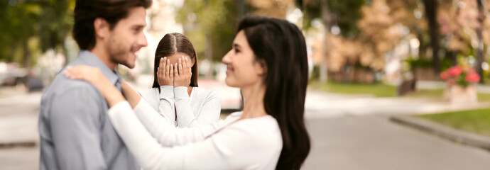 New love. Woman crying, watching her ex boyfriend starts happy love relations, park background