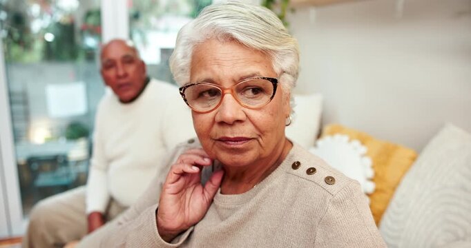 Senior couple, ignore and fight with conflict on sofa for disagreement, divorce or toxic relationship at home. Elderly man and woman with problem in living room dispute, breakup or argument at house