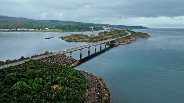 Aerial view of concrete road bridge Skye Bridge on the Isle of Skye. Bridge linking mainland Scotland and the Isle of Skye via Eilean B&agrave;n wildlife reserve.