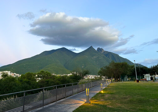 Panoramic view of Cerro de la Silla mountain in Mexico against a clear blue sky with clouds